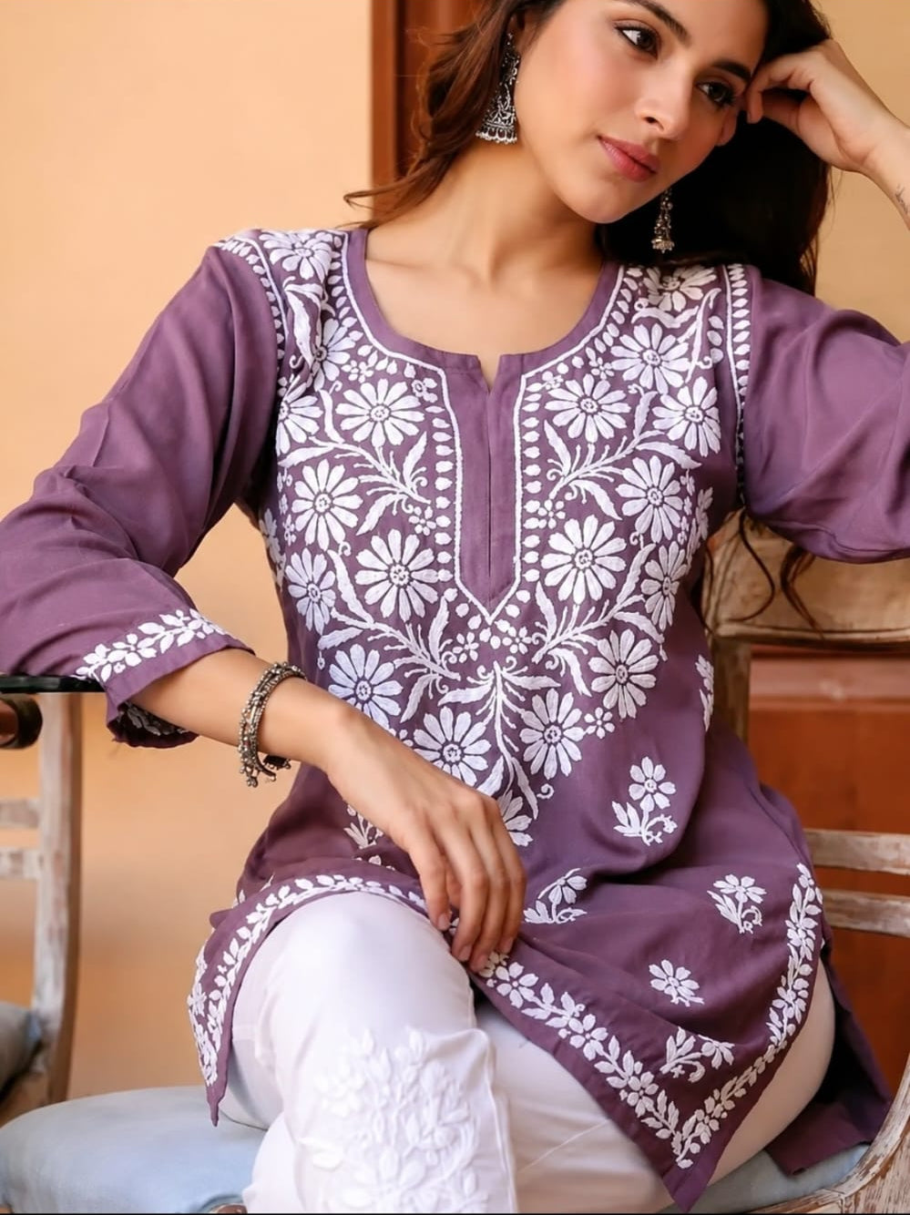 short kurta in notch neck, above knee, sleeve length is three quater