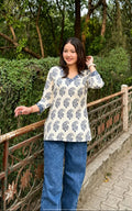 Rayon printed short kurti, V-neck, sleeves length is three quater