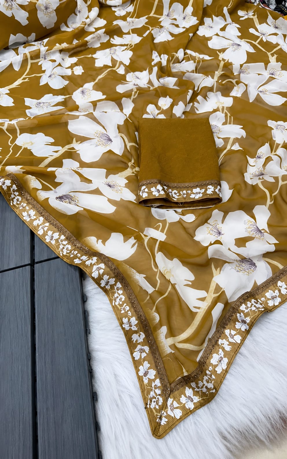 Brown colour ladies georgette saree with Running Blouse in georgette fabric
