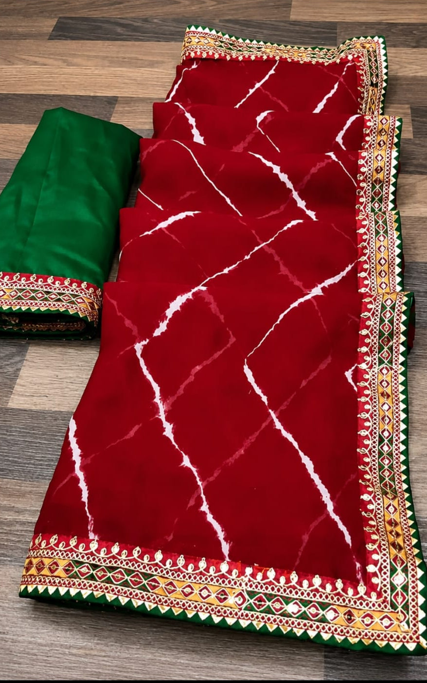 lahariya printed georgette saree with running blouse