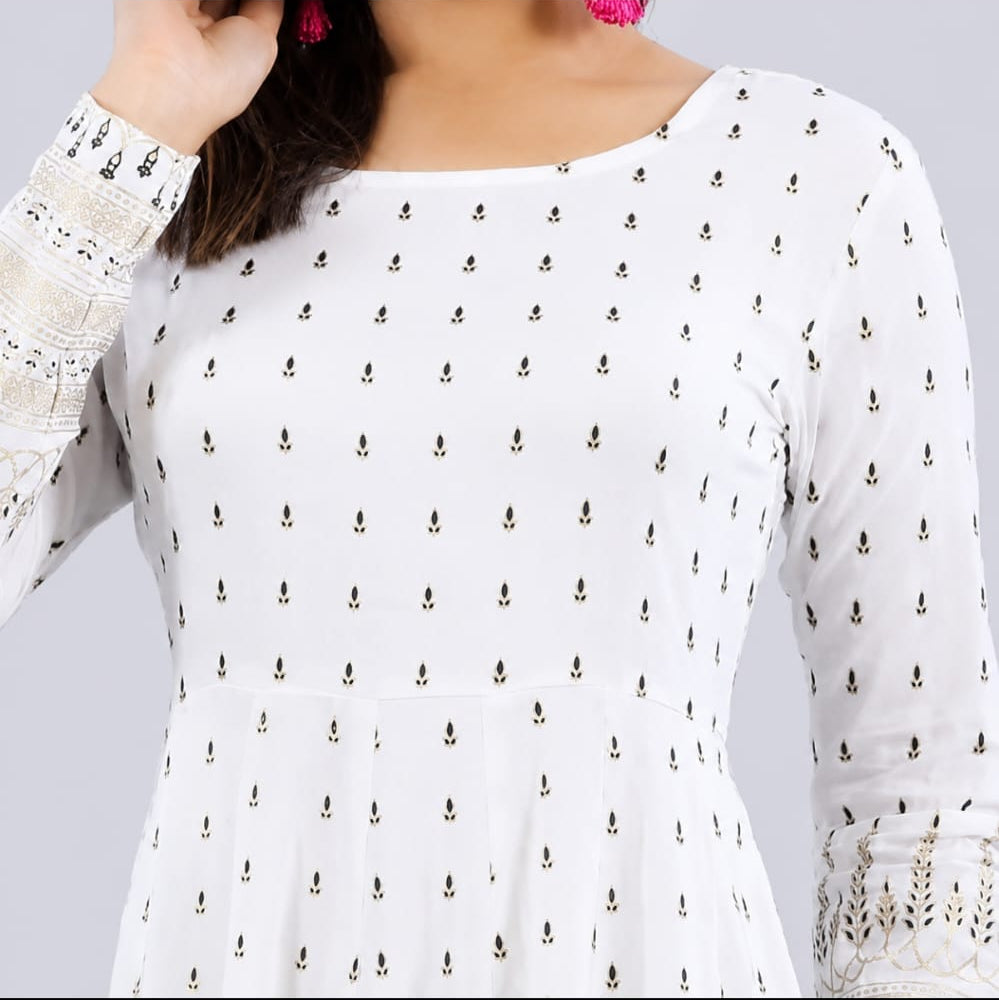 white rayon anarkali kurti in round neck, long sleeves, tassals and latkans