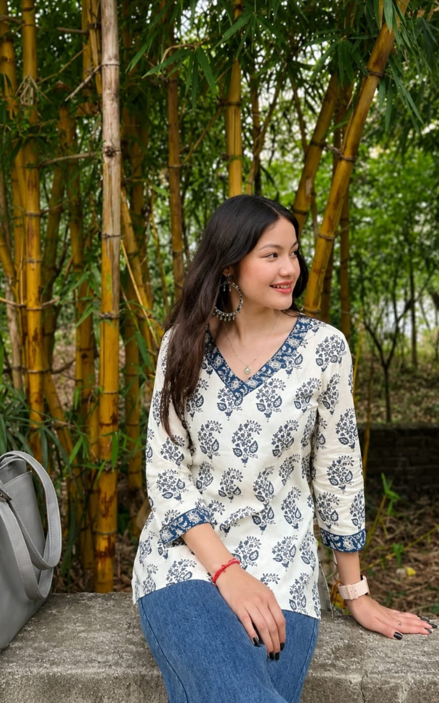 Rayon printed short kurti, V-neck, sleeves length is three quater