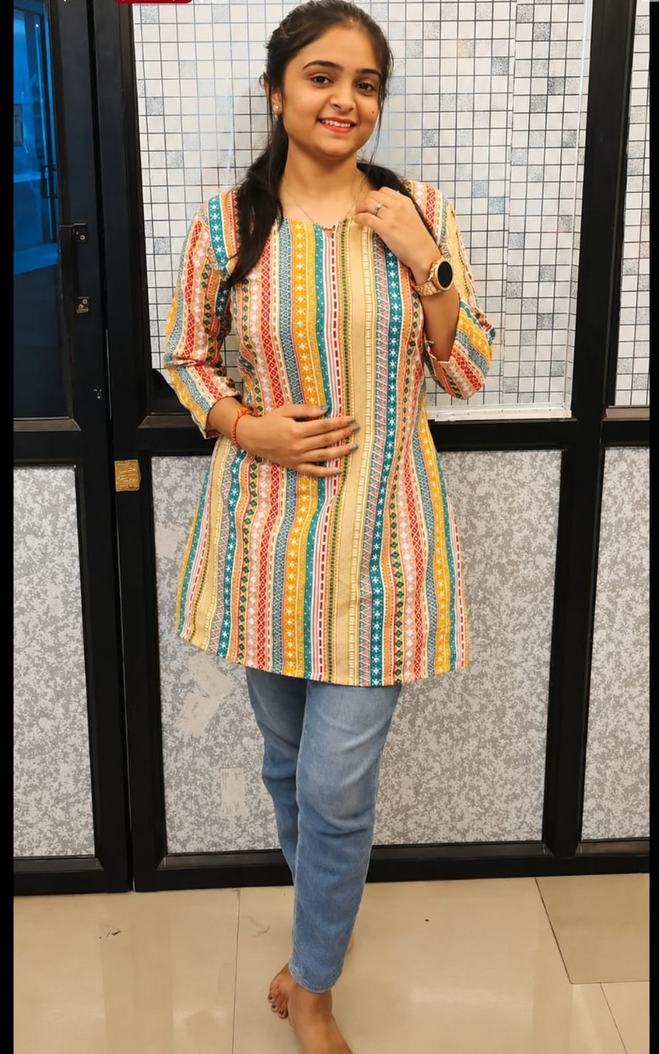 V-neck stitched kurti, above knee, sleeves length is three quater