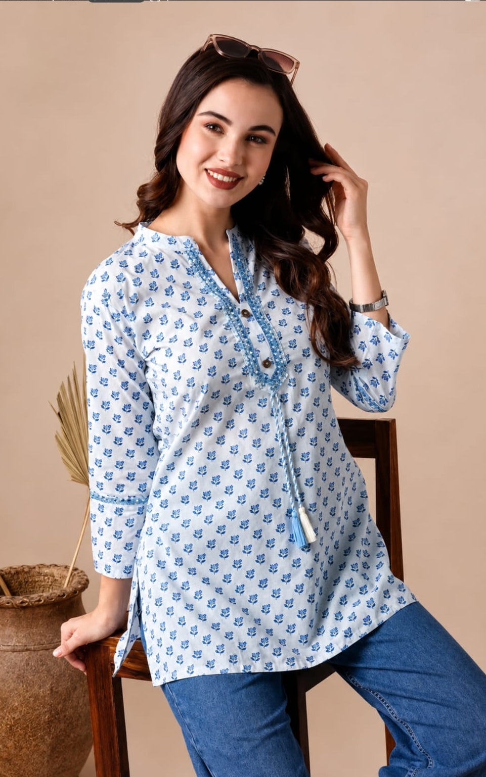 Rayon short kurti, round neck, above knee, sleeves length is three quater