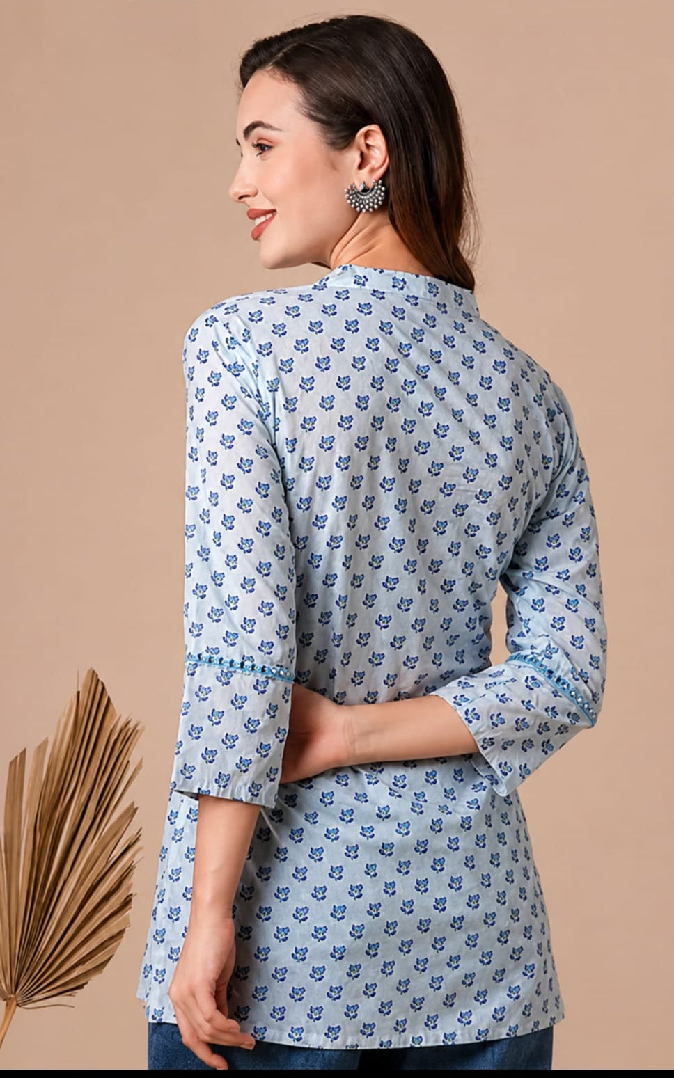 Rayon short kurti, round neck, above knee, sleeves length is three quater