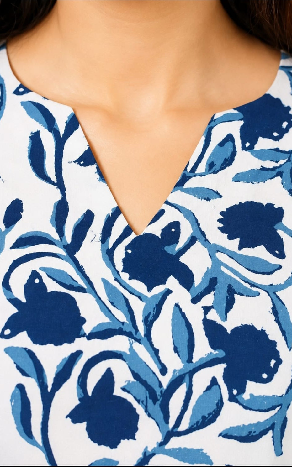 Cotton short kurti in Notch neck, sleeves length is three quater